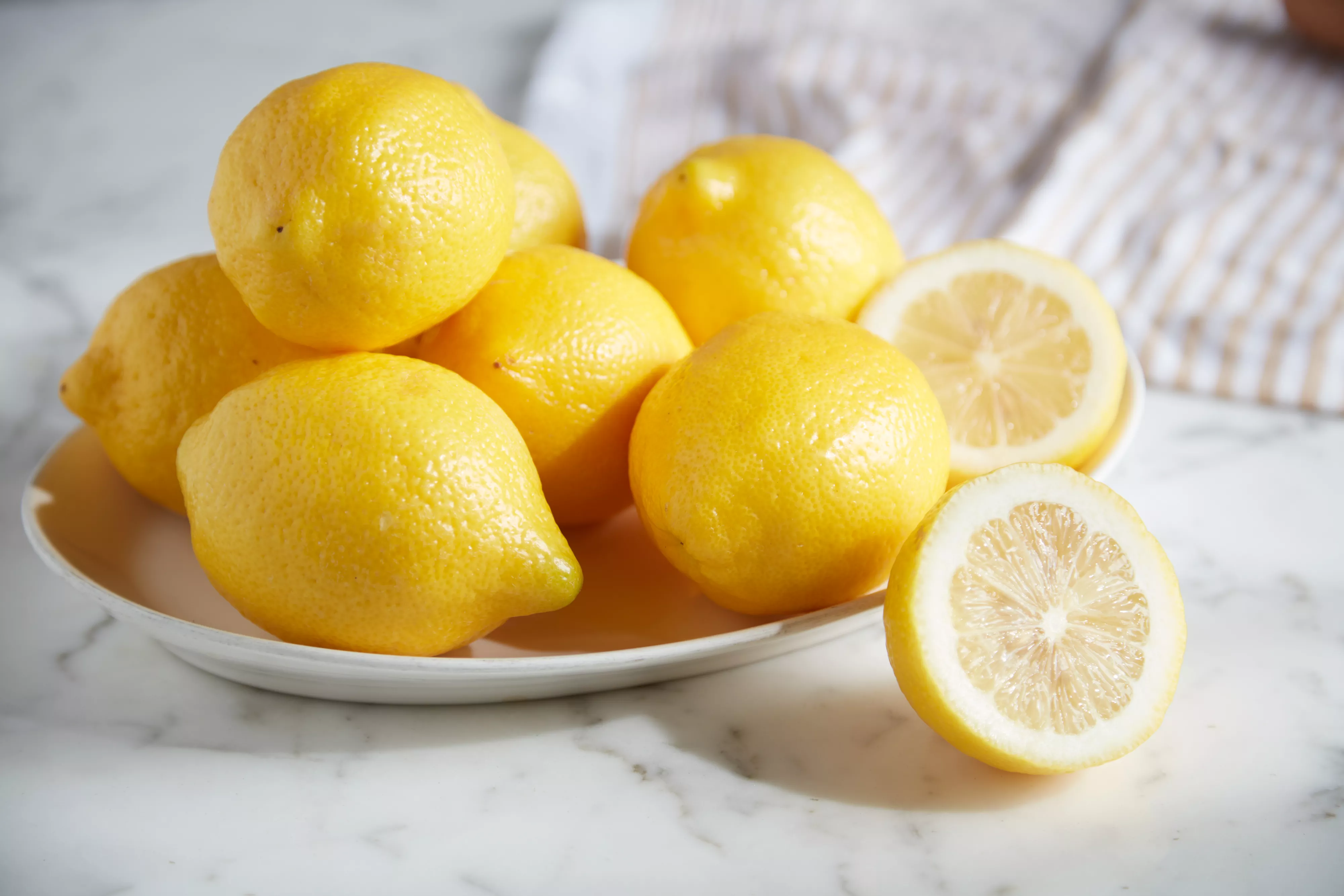 plate of lemons on kitchen counter for cleaning