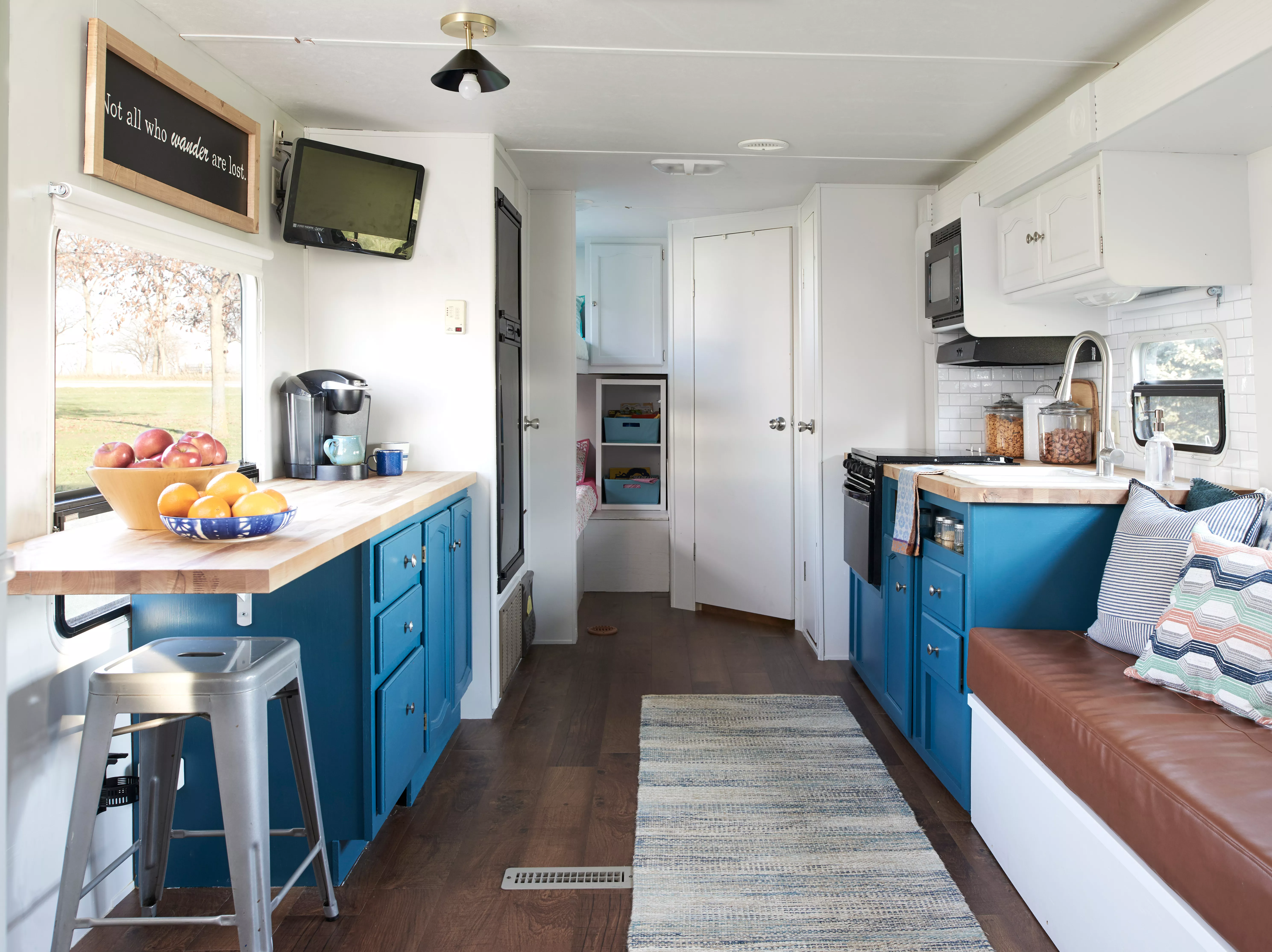 interior of rv with blue cabinets